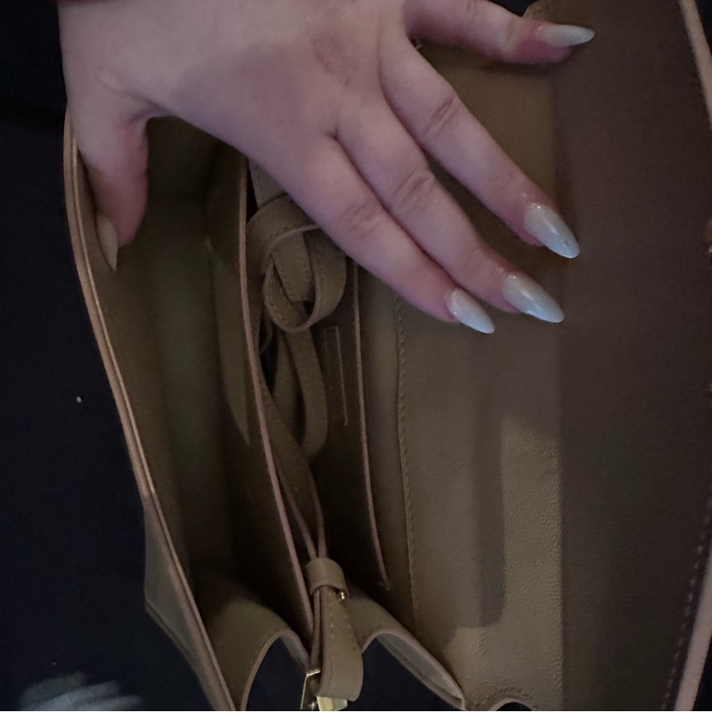 Shoulder or crossbody bag with gold hardware